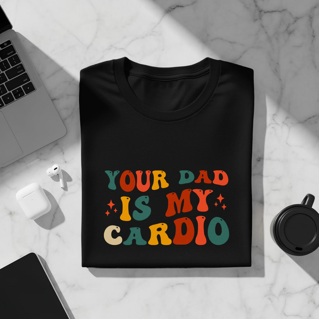 Black t-shirt with retro text reading "YOUR DAD IS MY CARDIO".