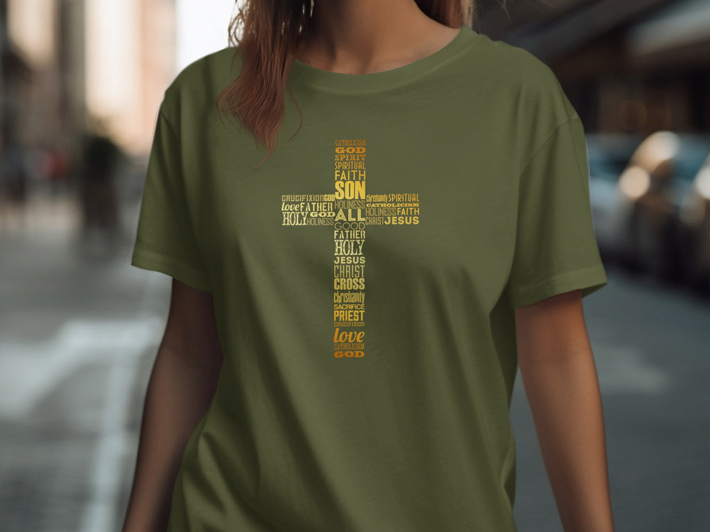 Olive t-shirt with yellow word cloud cross design featuring religious terms like God, Jesus, and Holy.