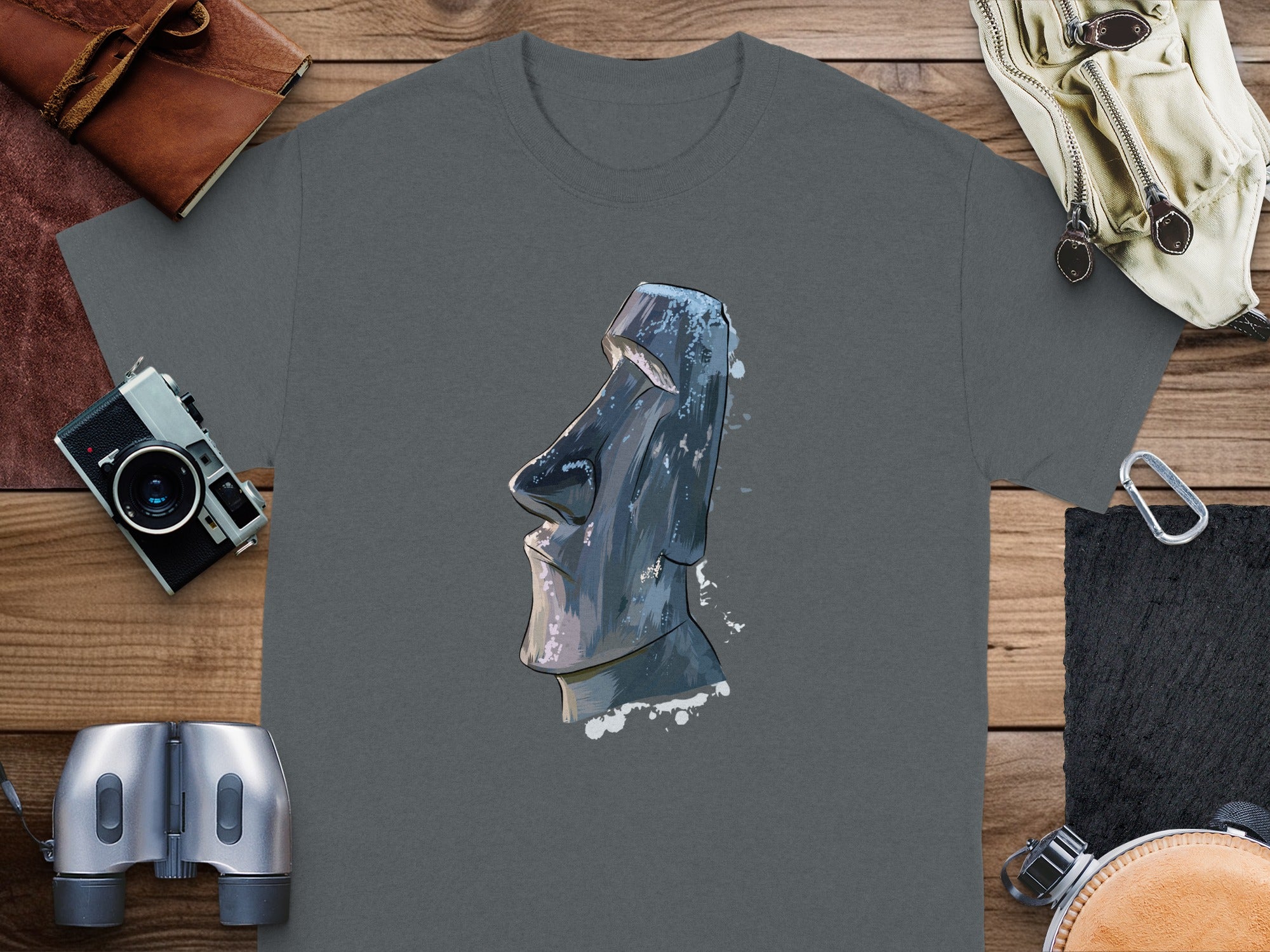 Dark grey t-shirt with a watercolor depiction of a Moai statue.