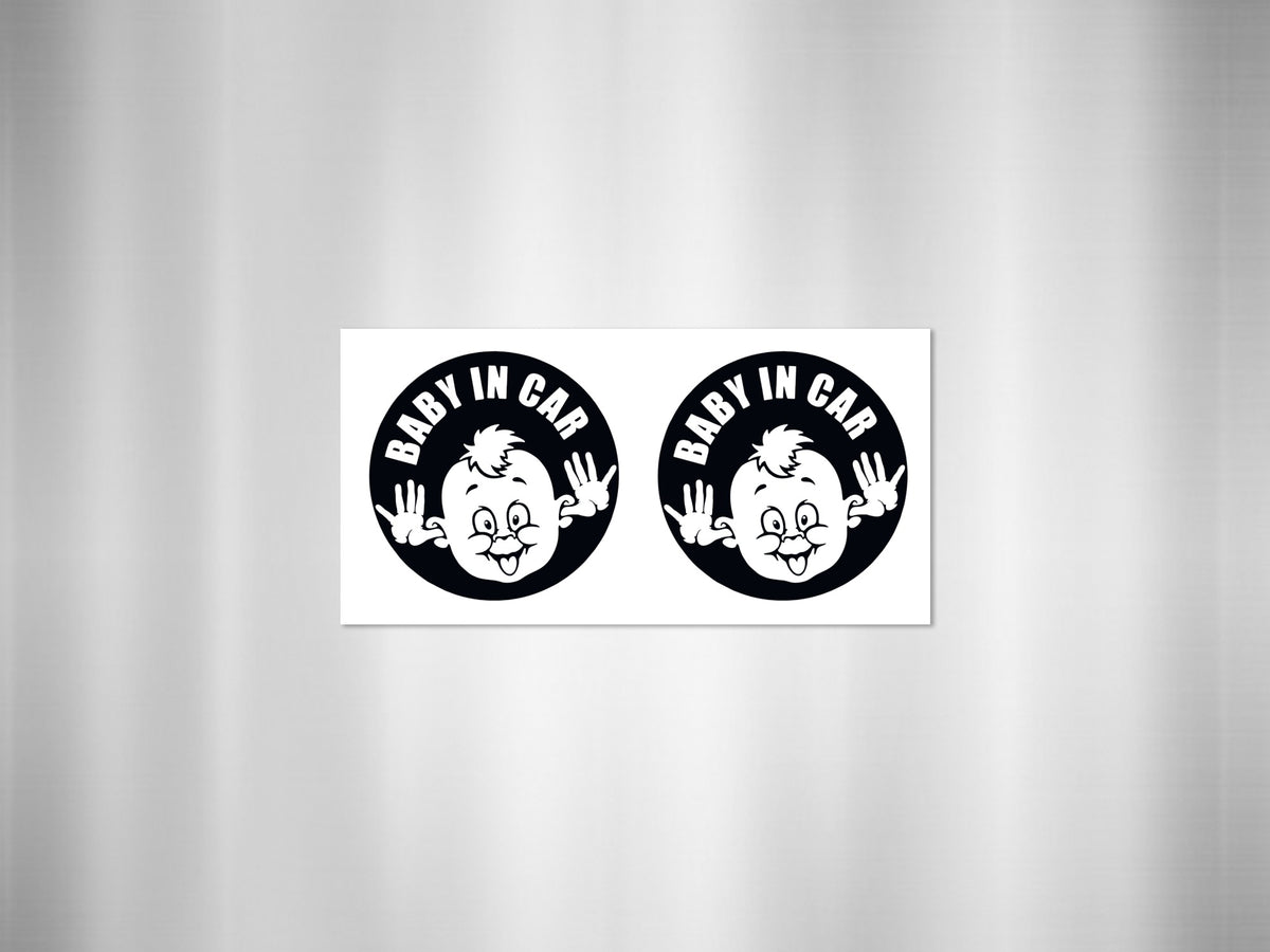 Two black and white "Baby In Car" circular decals featuring a cartoon baby's face.