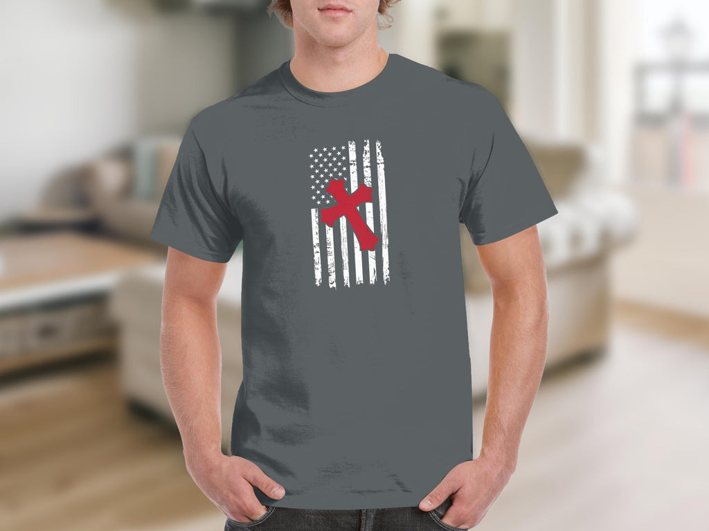 Grey t-shirt with distressed US flag and red cross graphic.