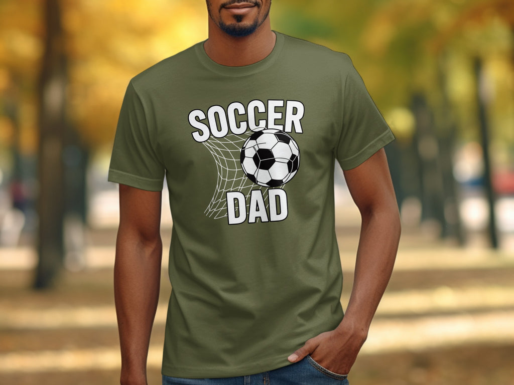 Olive green t-shirt with "Soccer Dad" text and a soccer ball.