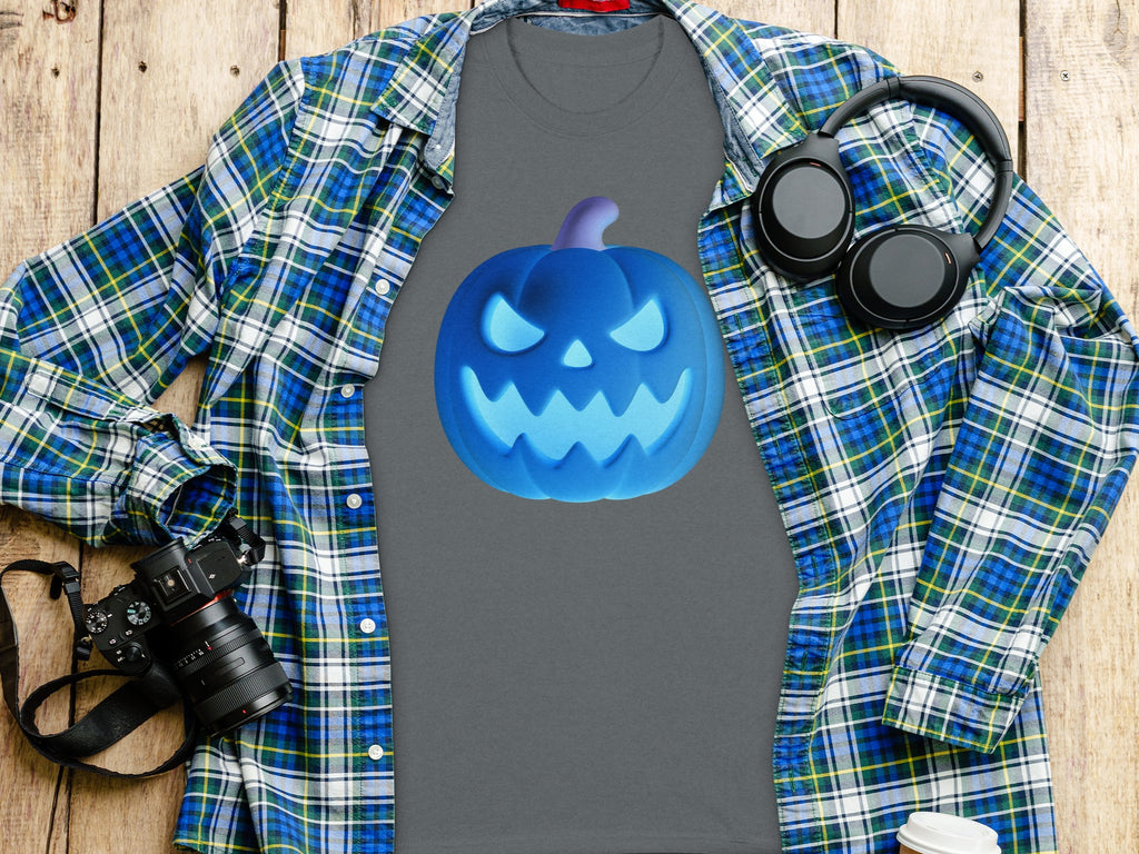 Grey t-shirt with a glowing blue jack-o'-lantern graphic, over a plaid shirt.