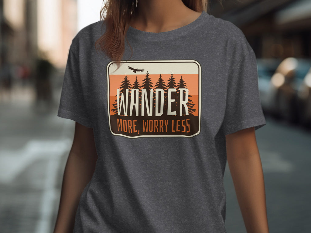 Dark grey t-shirt with a framed graphic of trees, a bird, and text.
