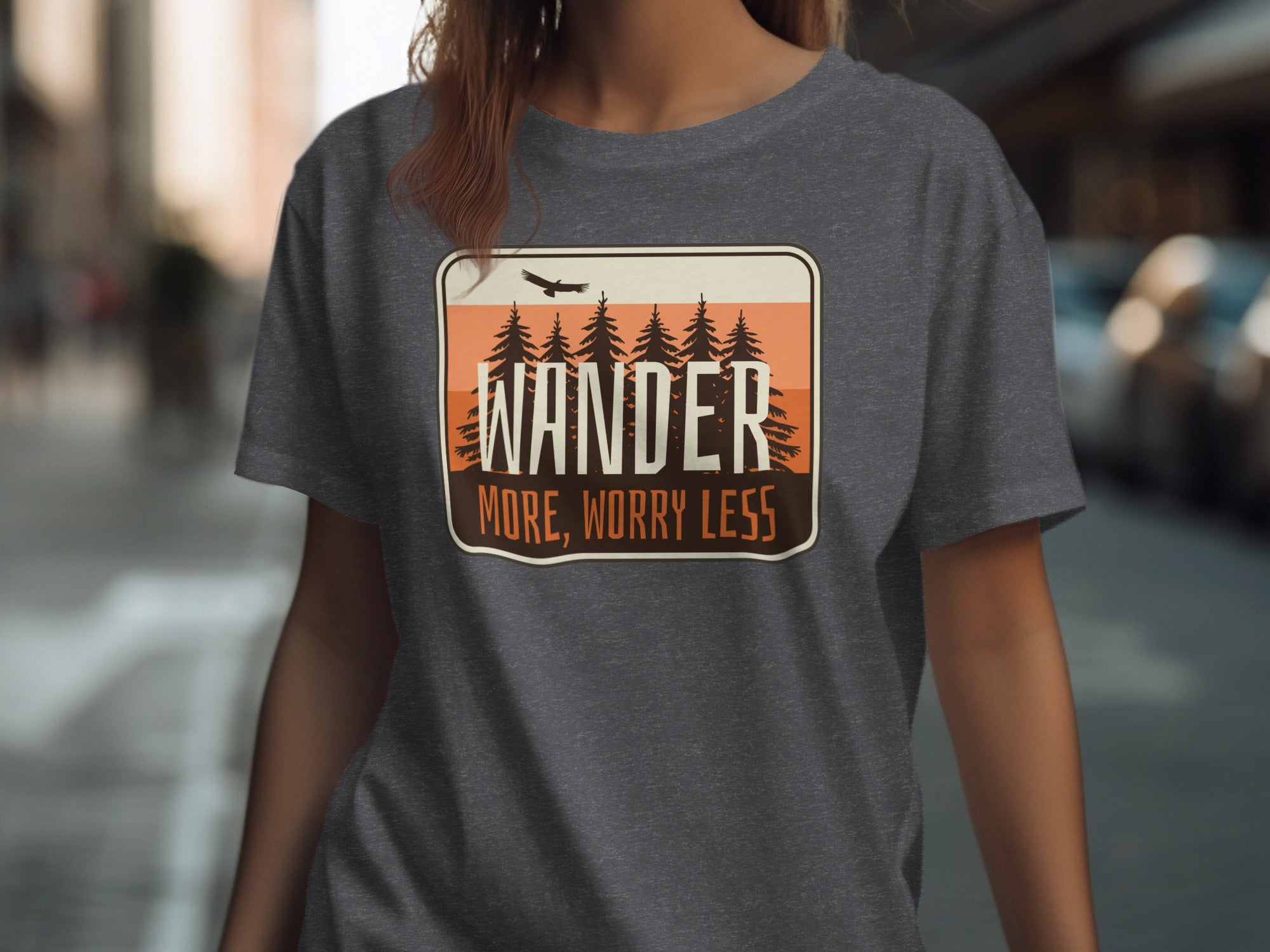 Dark grey t-shirt with a framed graphic of trees, a bird, and text.