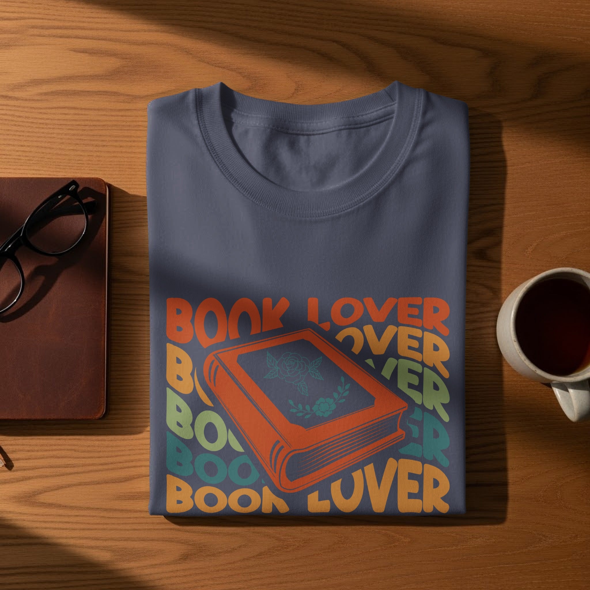 Dark blue t-shirt with "Book Lover" text and an orange book graphic.