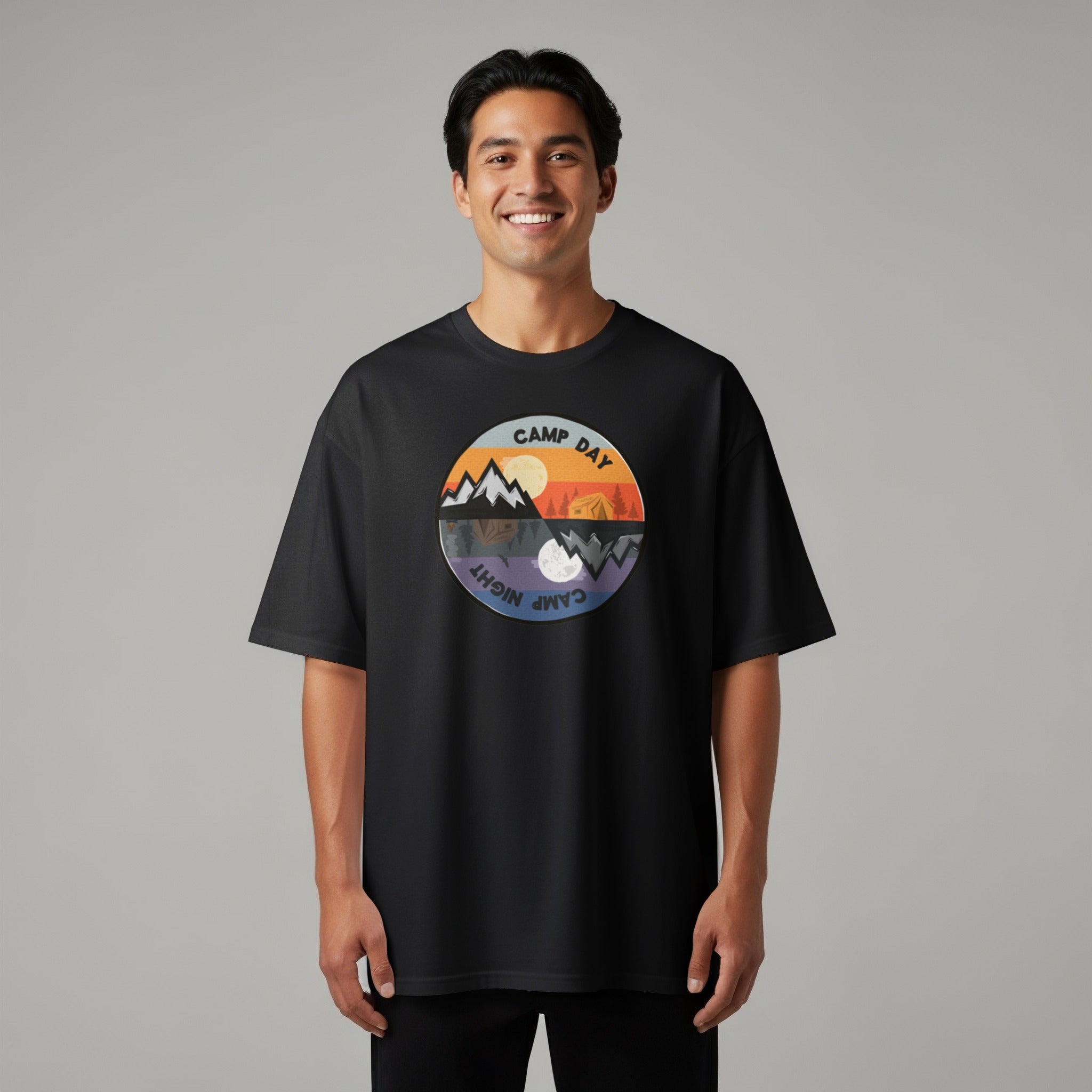 Black t-shirt with a circular graphic showing camp day and camp night.