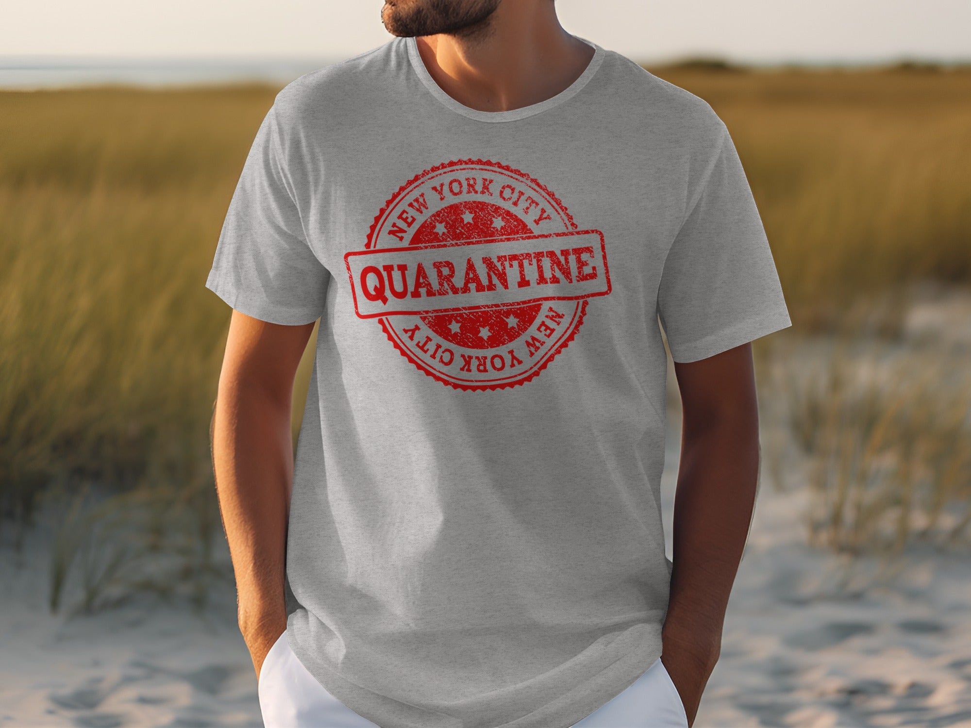 Grey t-shirt with a red New York City Quarantine stamp graphic.