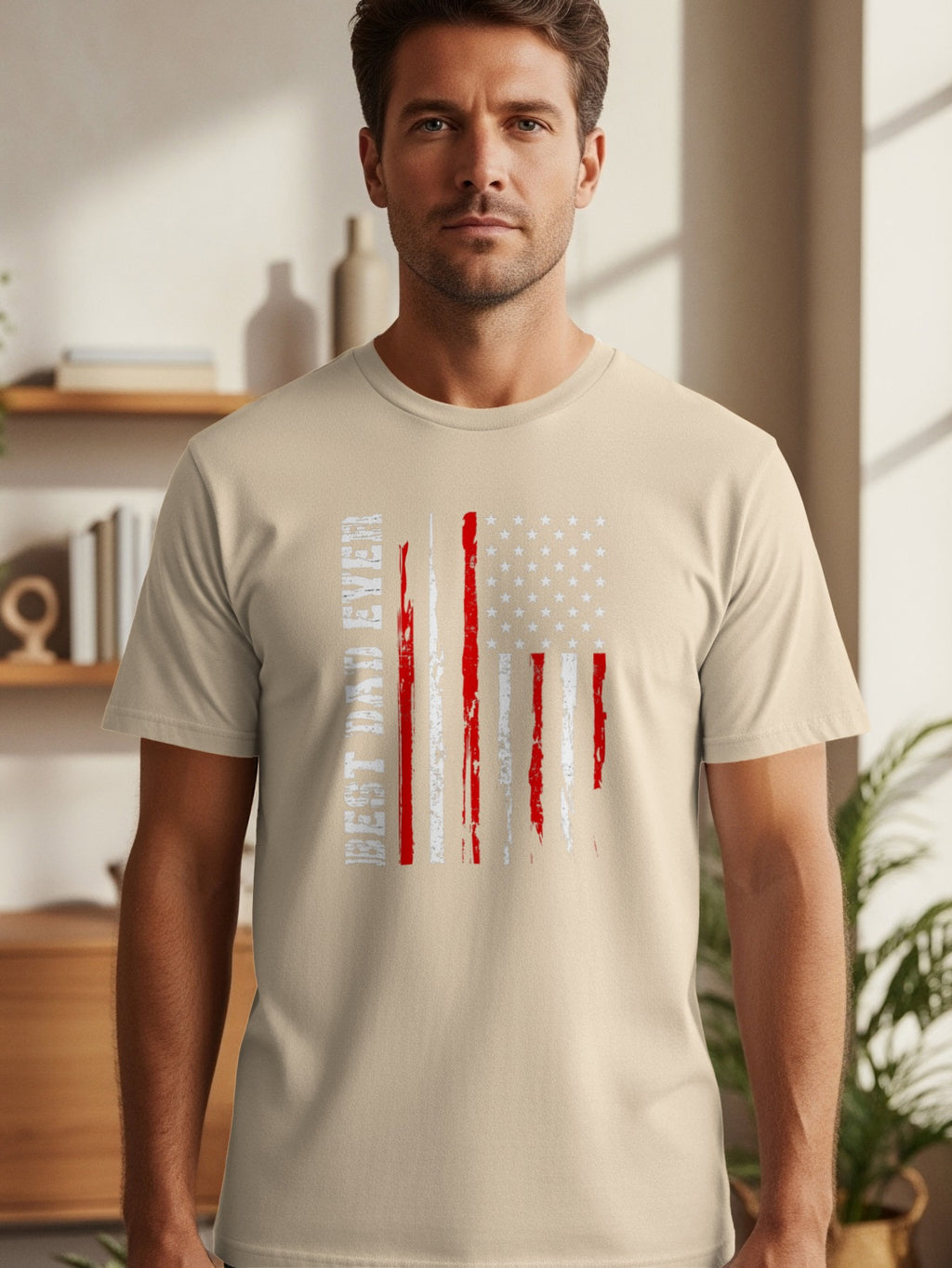Man wearing a tan t-shirt with a distressed American flag graphic and text.