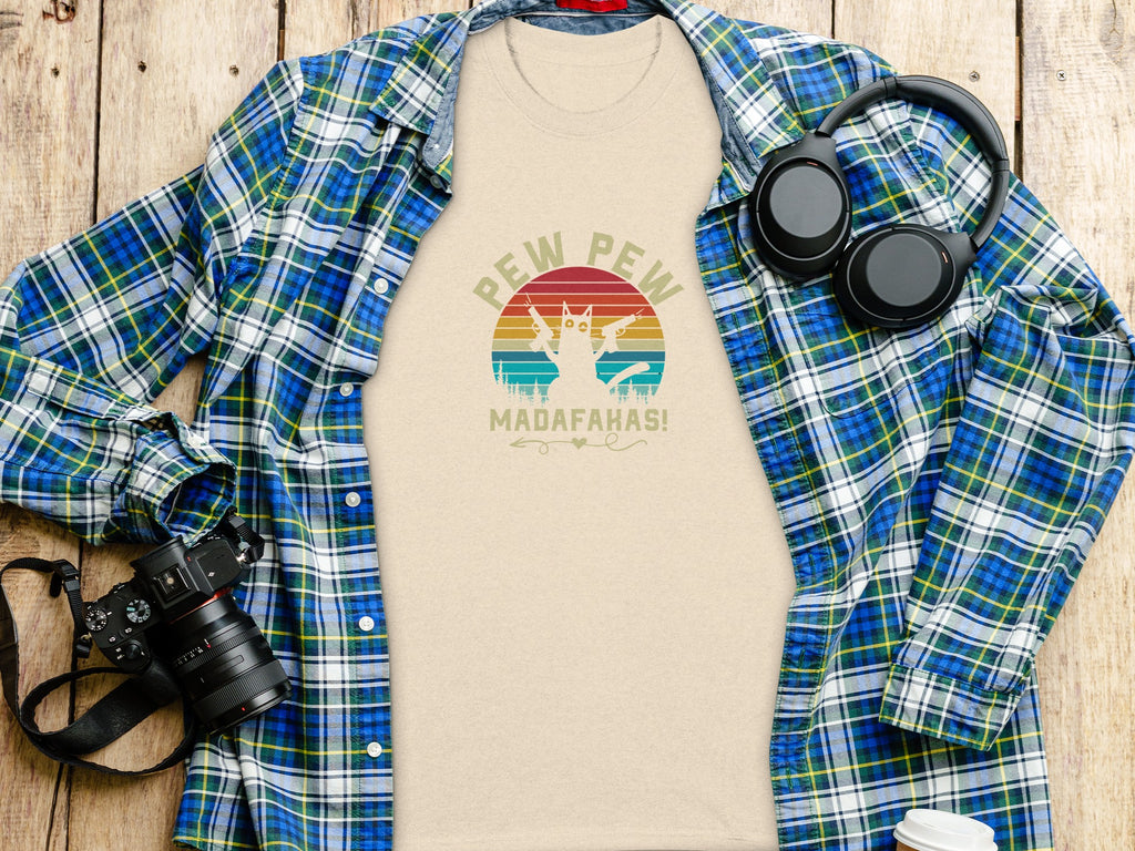 Light beige t-shirt with cat holding guns and "Pew Pew Madafakas!" text.