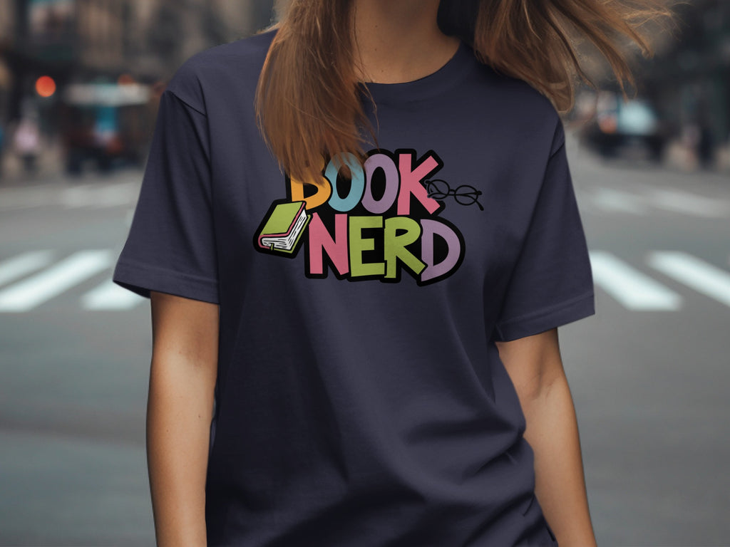 Dark blue t-shirt with colorful "BOOK NERD" text and an open book.