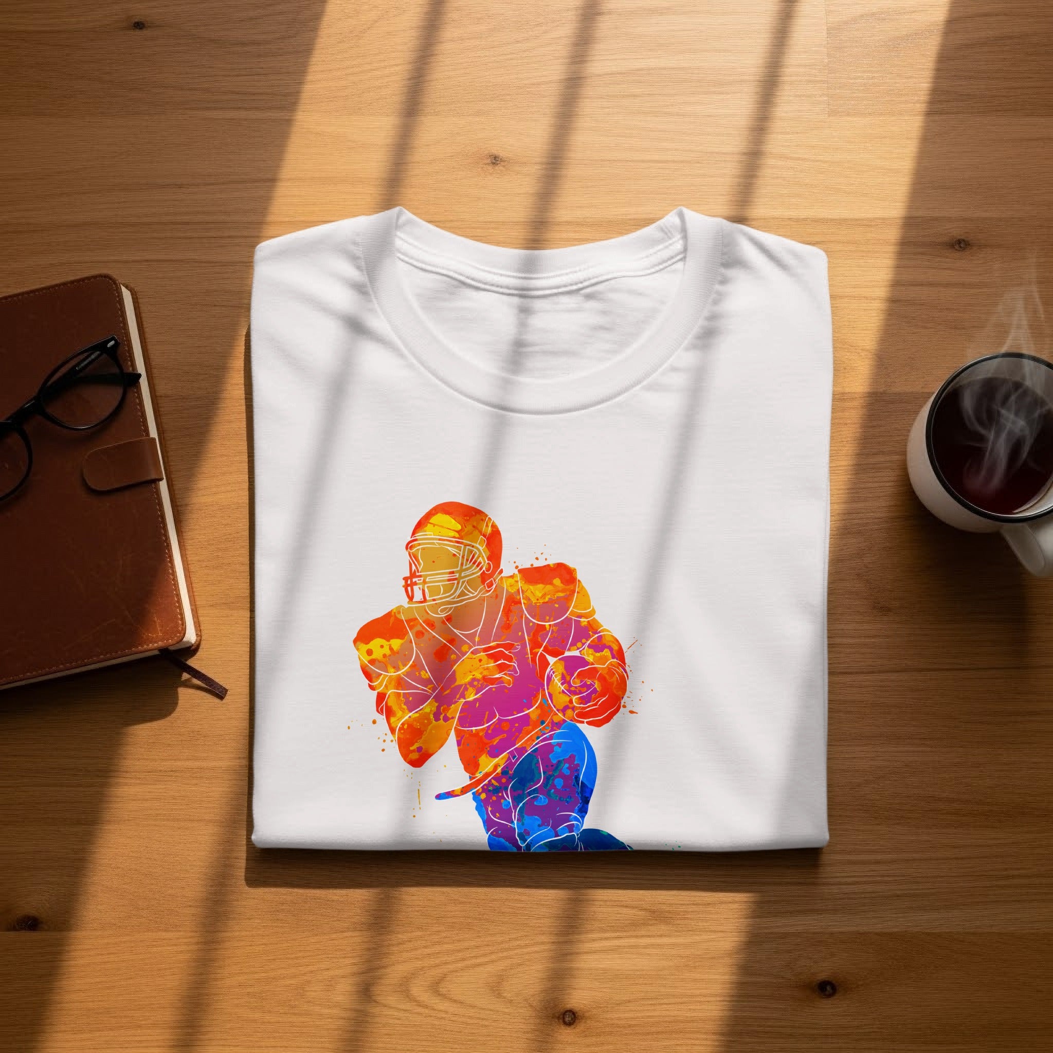 White t-shirt with a colorful watercolor football player graphic.