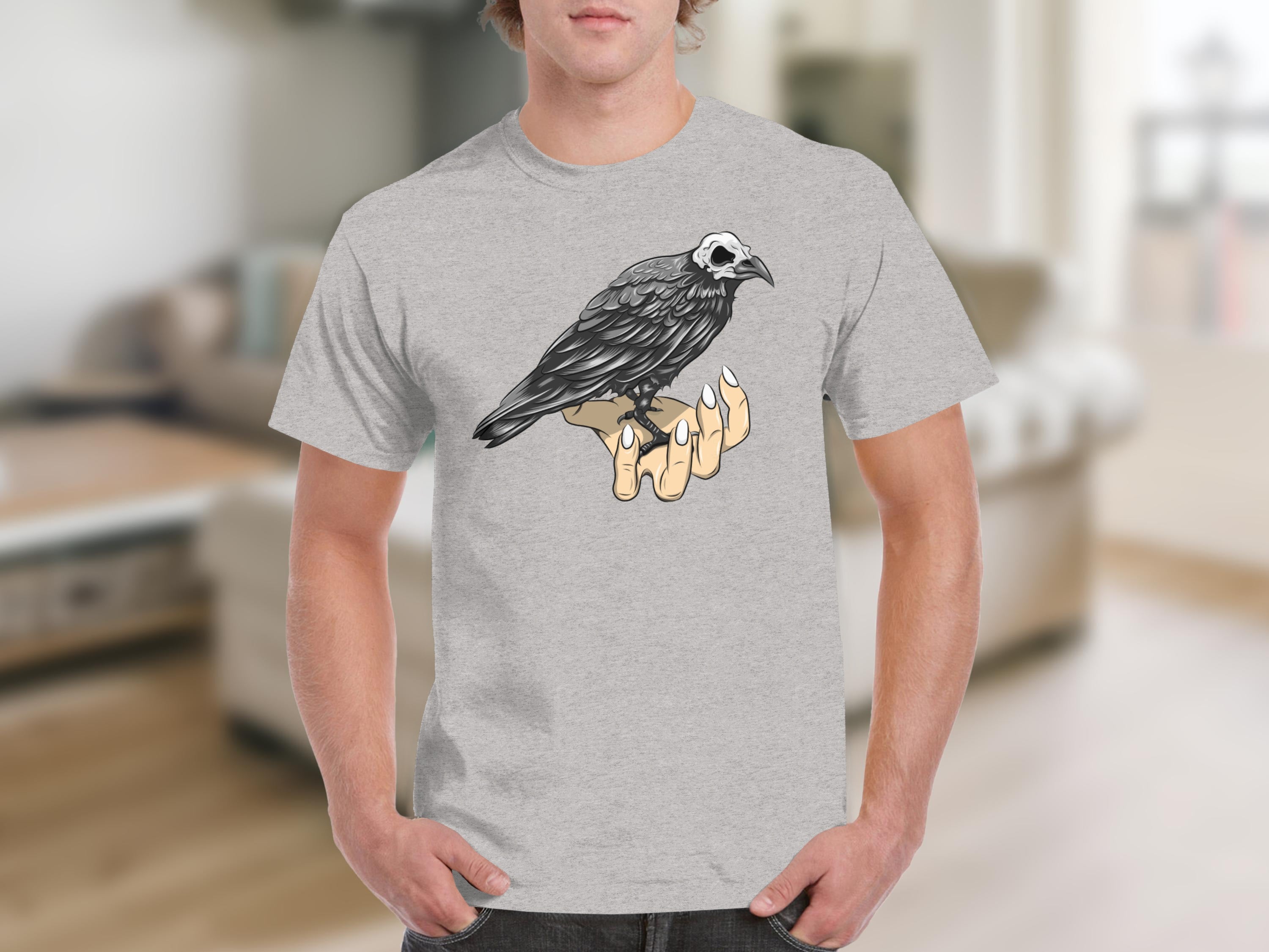 T-shirt with a detailed drawing of a skeletal crow on an open hand.