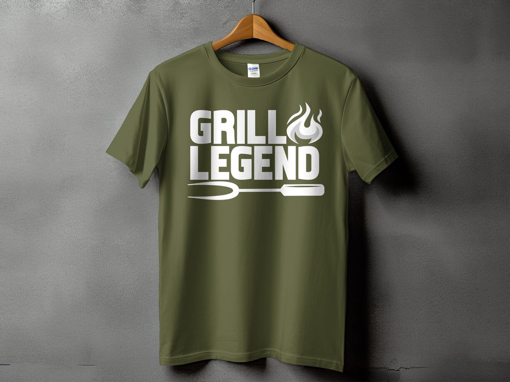 Olive green t-shirt with "Grill Legend" text and grill fork graphic.