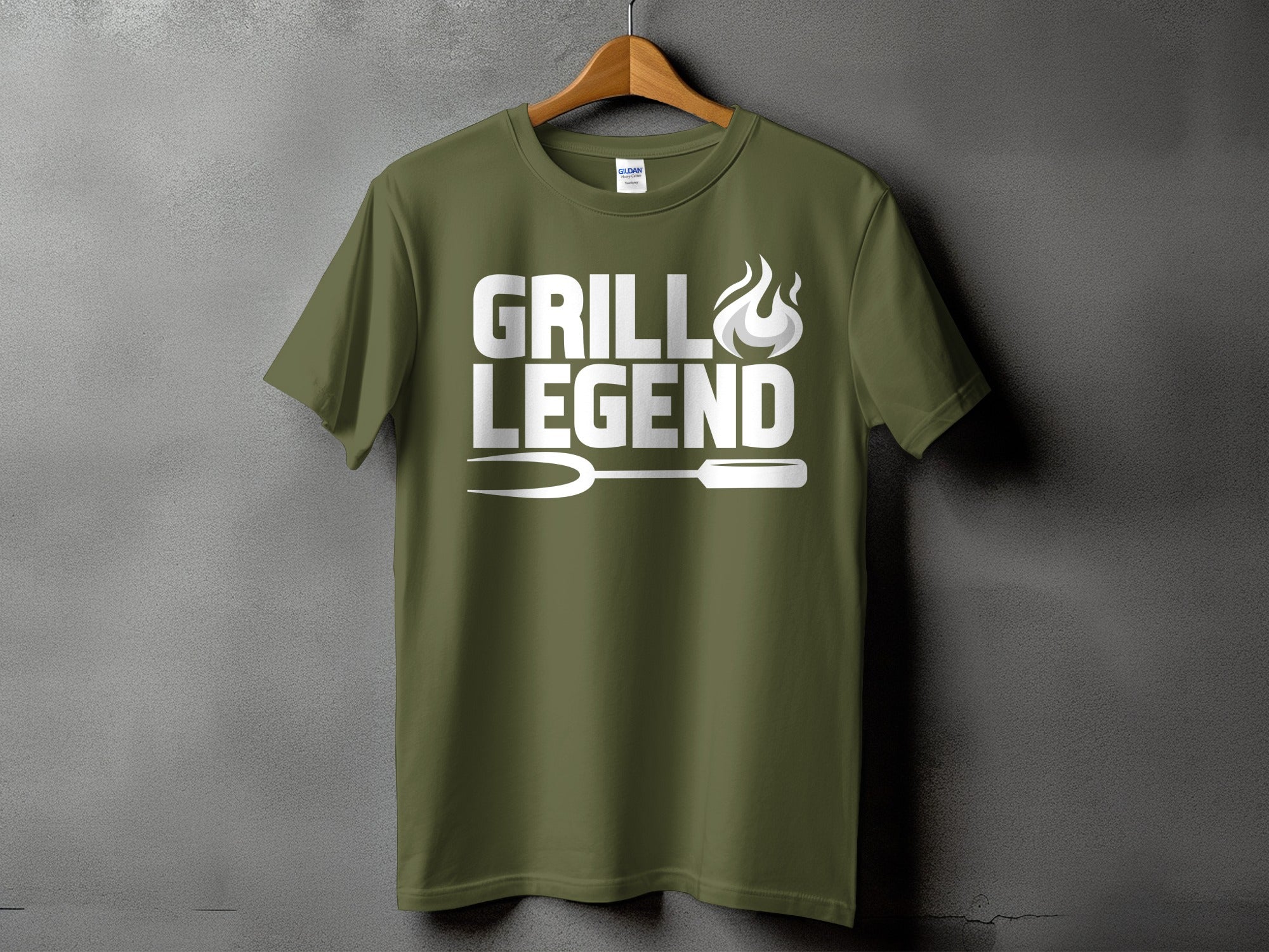 Olive green t-shirt with "Grill Legend" text and grill fork graphic.