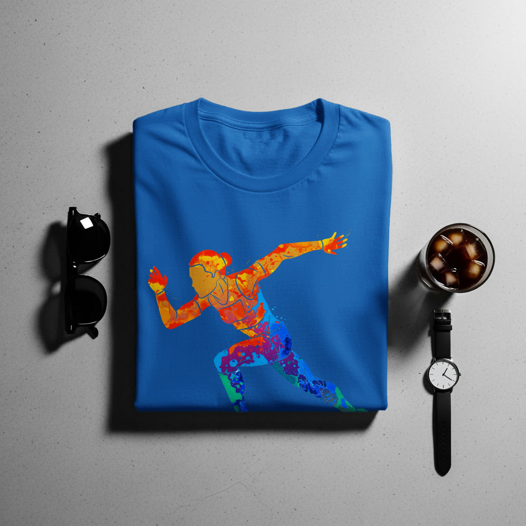 Blue t-shirt with colorful abstract runner graphic, black sunglasses, watch, and drink.