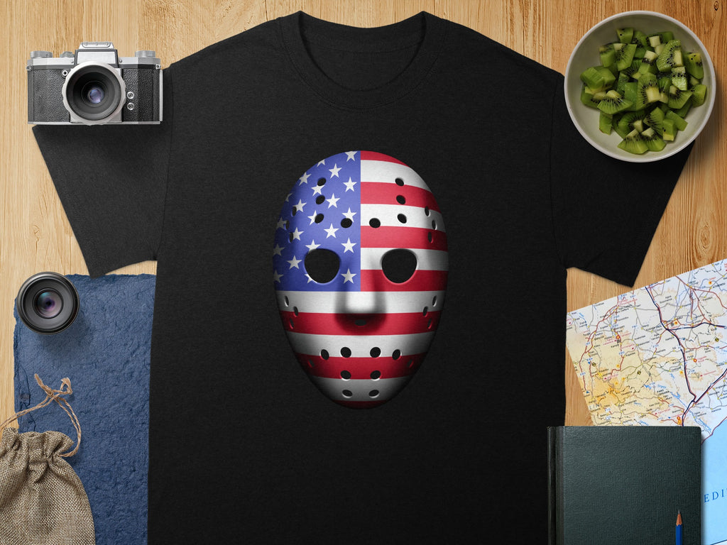 Black t-shirt with American flag hockey mask graphic.