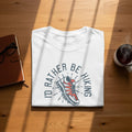 White t-shirt with "I'd Rather Be Hiking" text and graphic of a hiking boot.