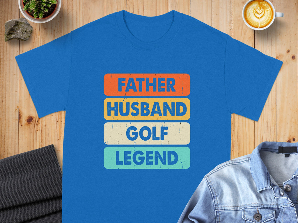 Blue t-shirt with "Father Husband Golf Legend" text in distressed blocks.