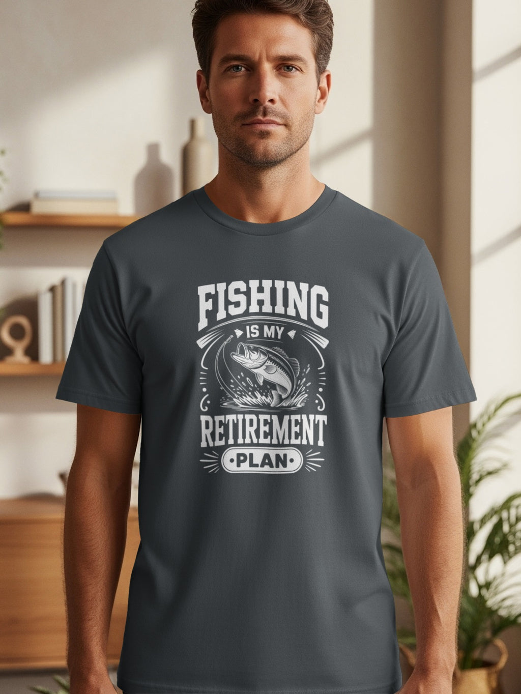 T-shirt with text "Fishing is my retirement plan" and fish graphic.