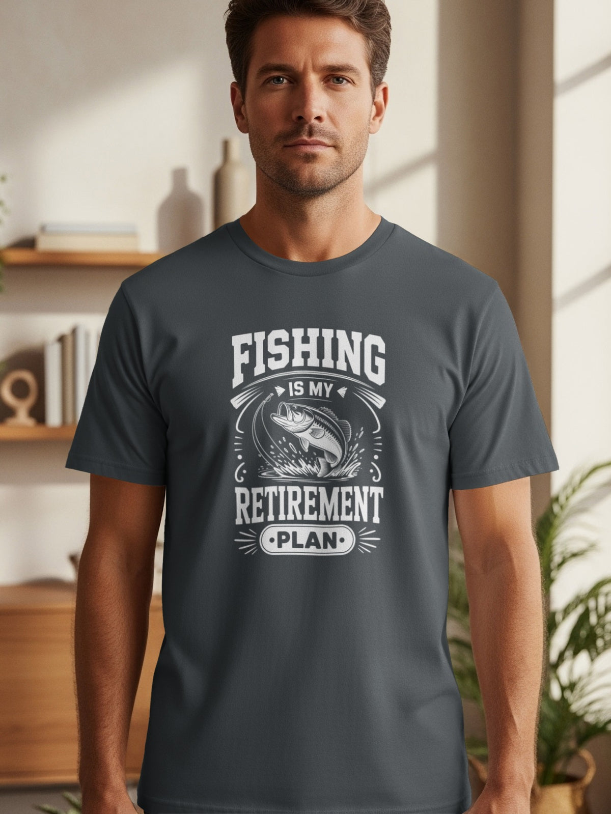 T-shirt with text "Fishing is my retirement plan" and fish graphic.