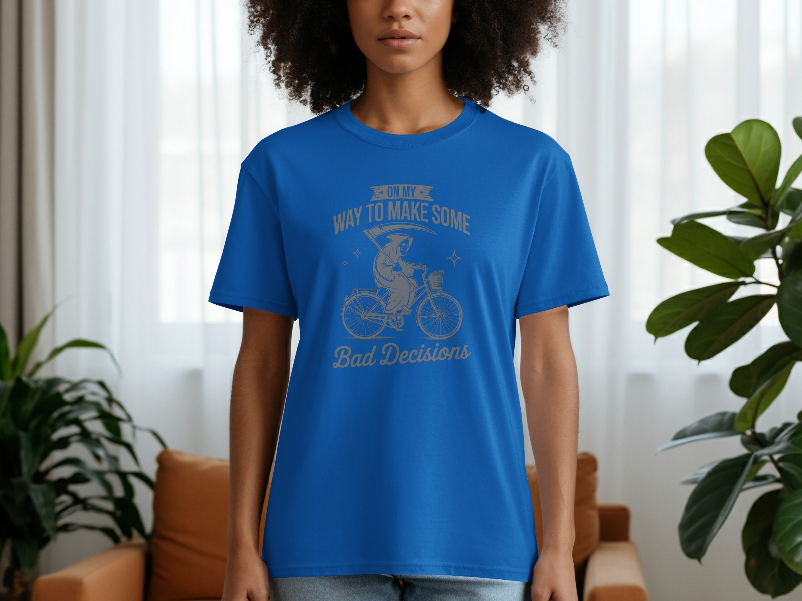 Blue t-shirt with grim reaper on bicycle graphic and text "On My Way To Make Some Bad Decisions".