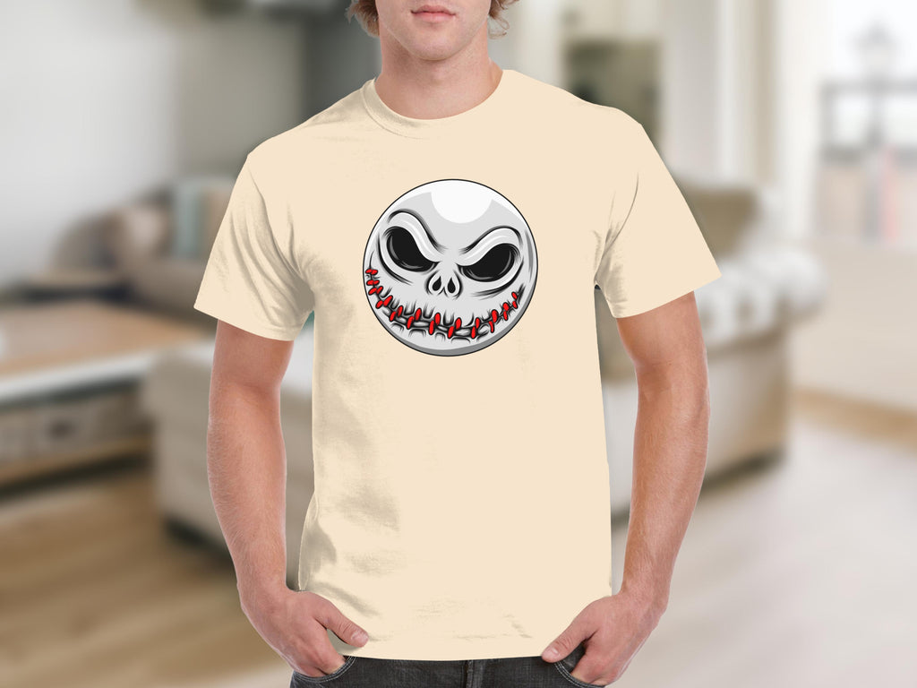 Pale yellow t-shirt featuring a round cartoon jack-o'-lantern face design.