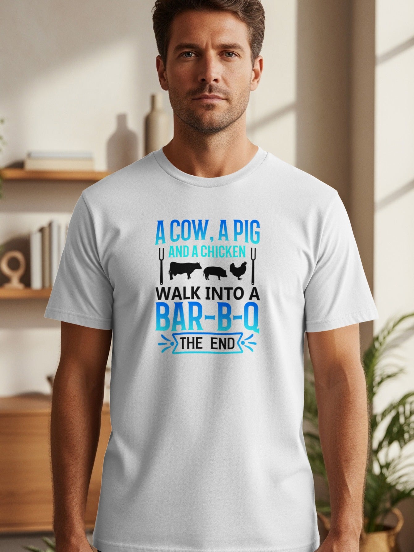 White t-shirt with text "A cow, a pig and a chicken walk into a bar-b-q the end".
