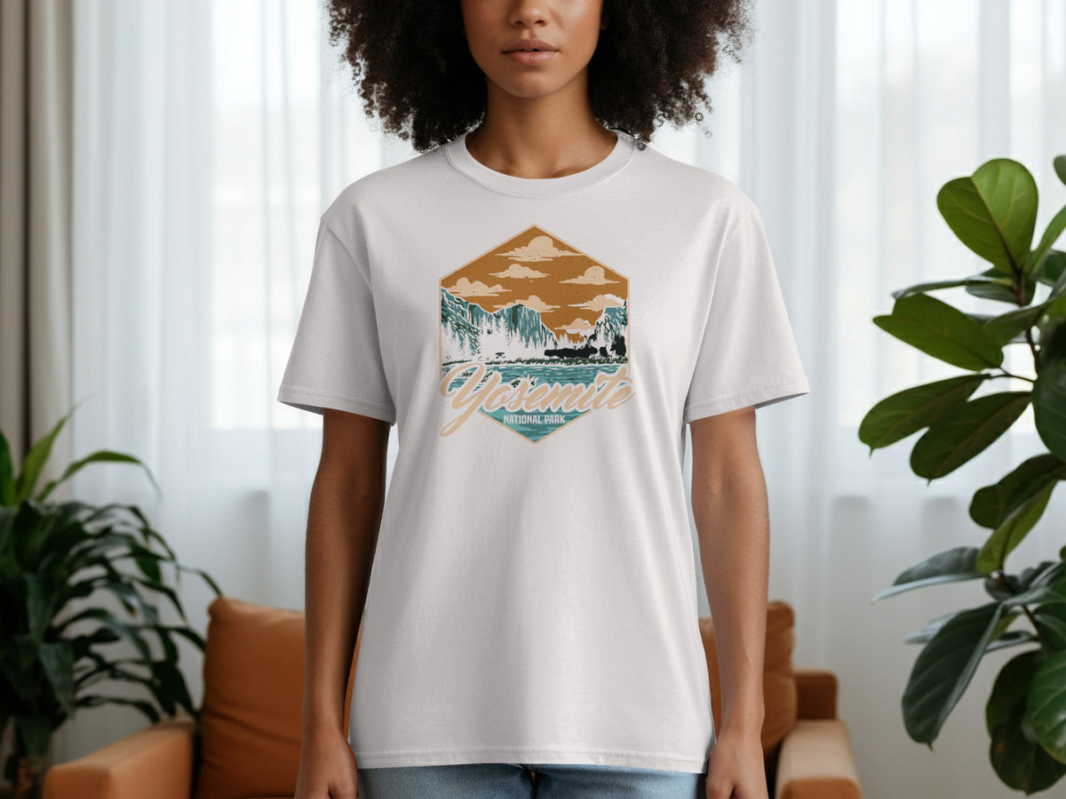 White t-shirt with Yosemite National Park graphic featuring mountains, trees, and a river.