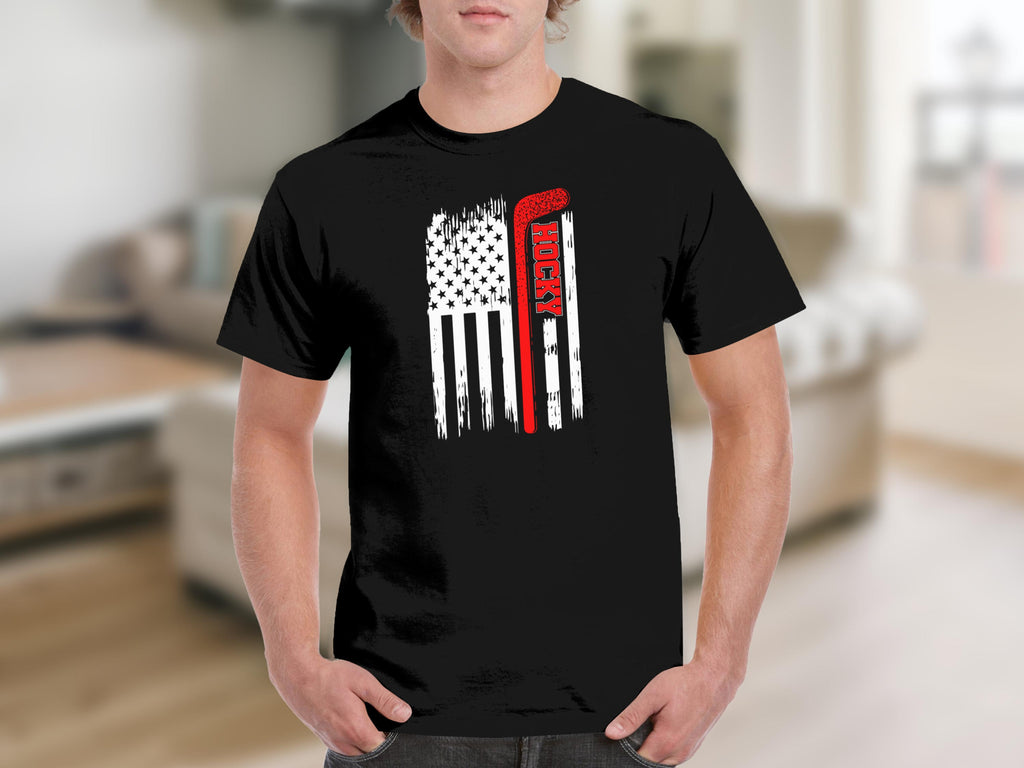 Black t-shirt with distressed American flag and hockey stick graphic.
