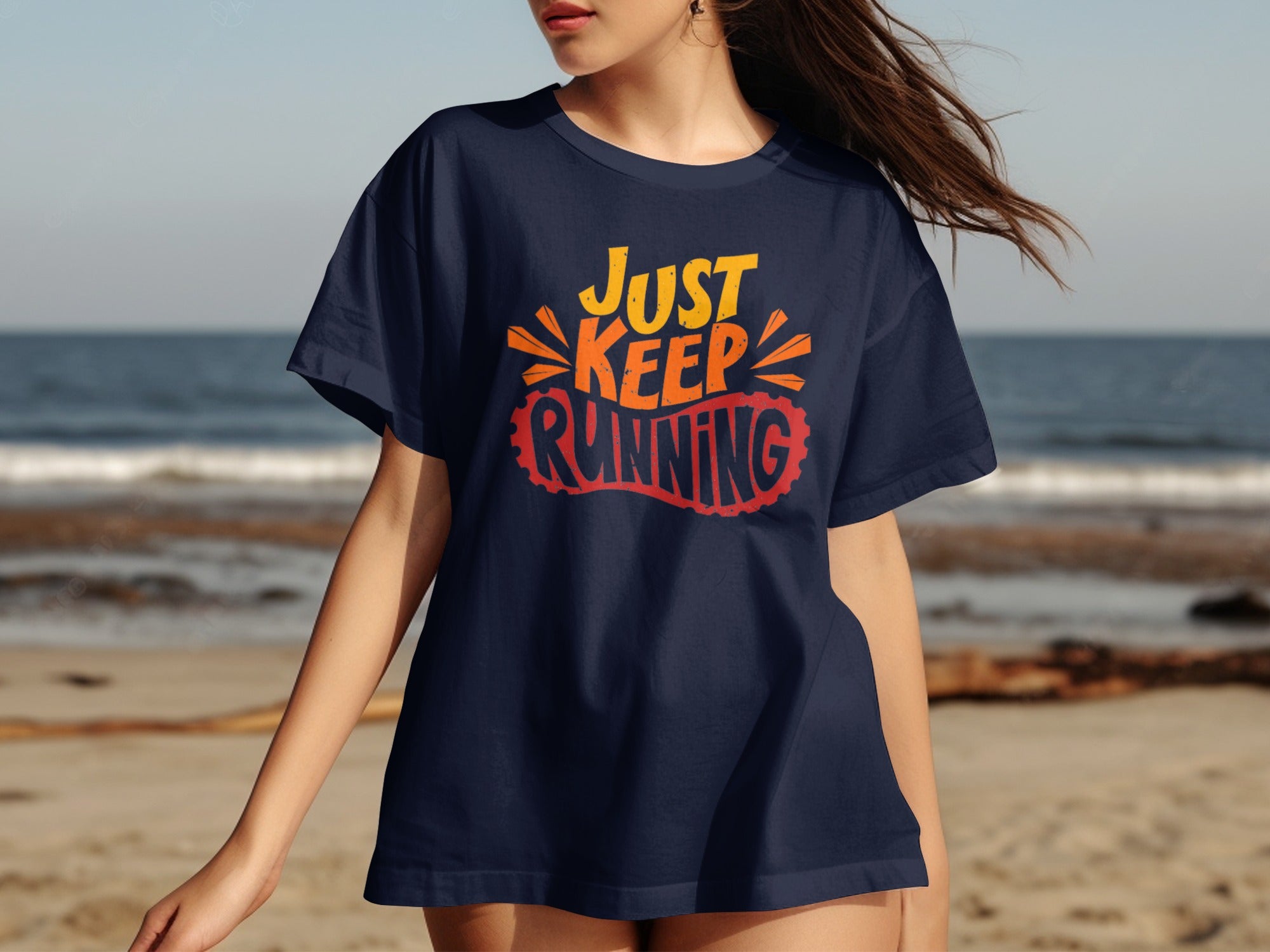 Navy t-shirt with orange and yellow "Just Keep Running" graphic and footprint.