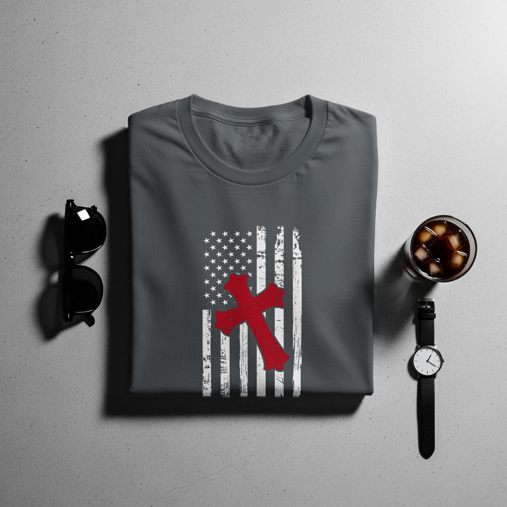 Dark gray t-shirt with distressed US flag and red cross graphic.