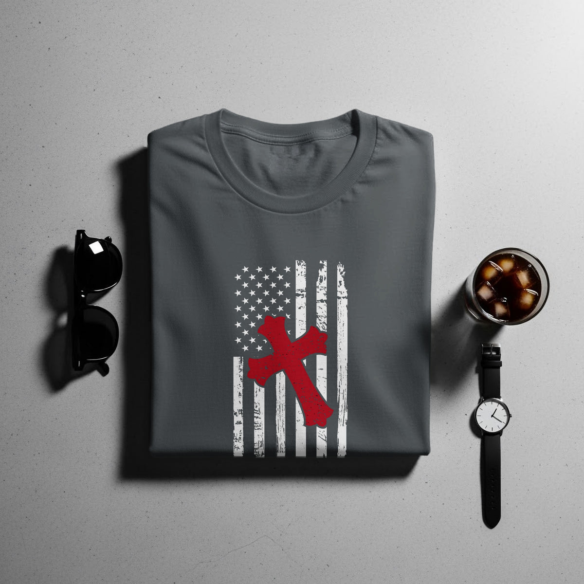 Dark gray t-shirt with distressed US flag and red cross graphic.