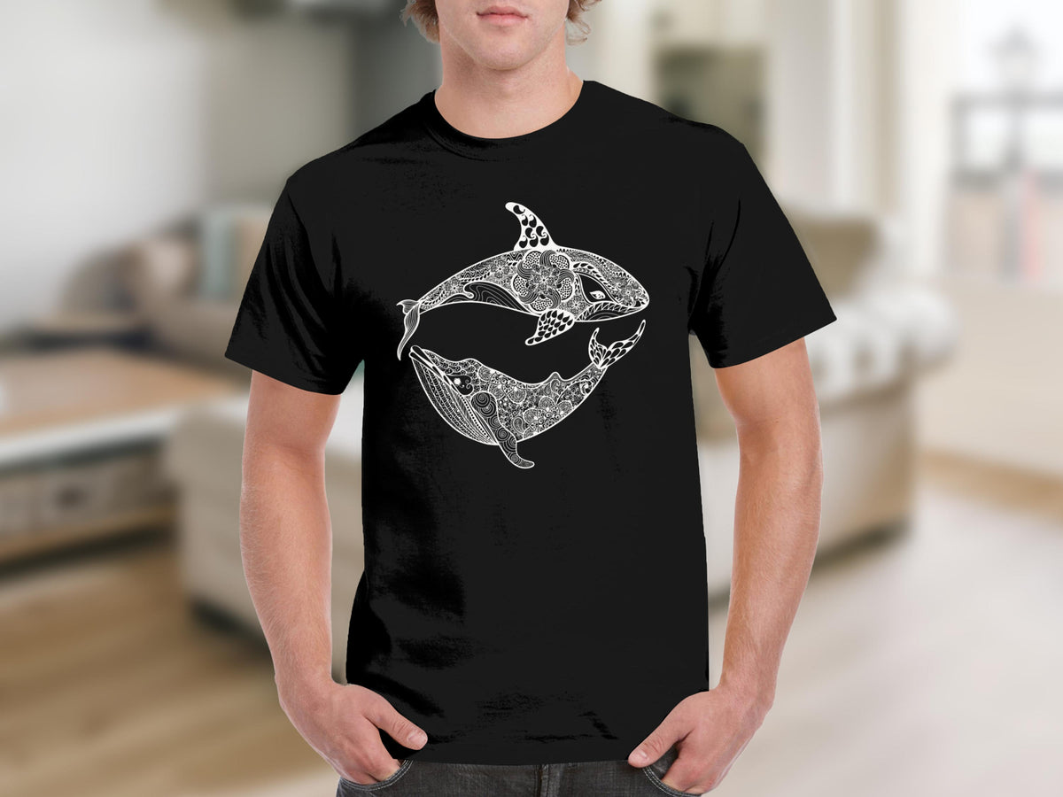 Black t-shirt with a white orca and whale design with intricate patterns.