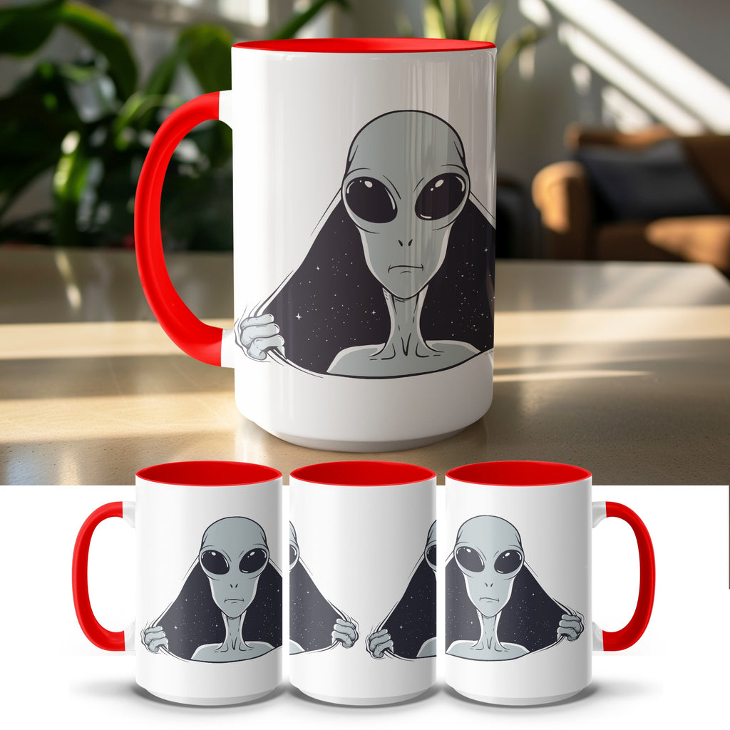 White mug with red interior and handle featuring an alien peeking through stars.