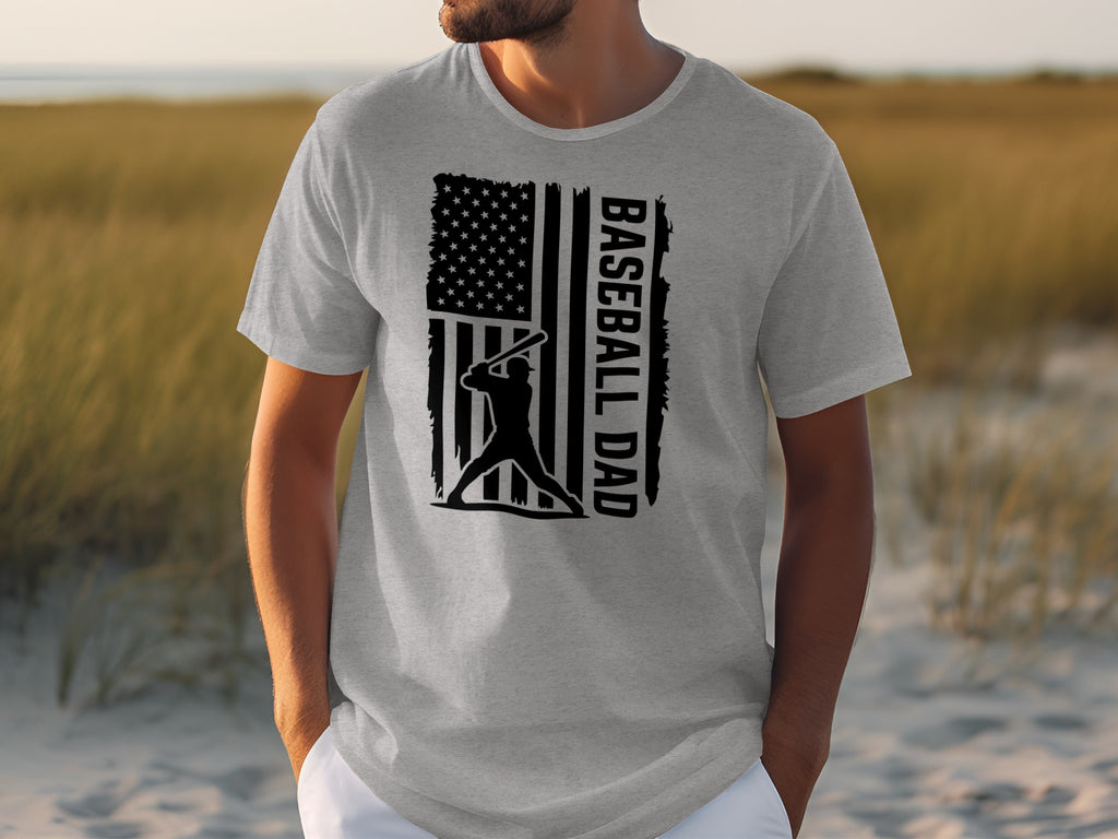 Gray t-shirt with baseball player silhouette, American flag, and text "BASEBALL DAD".