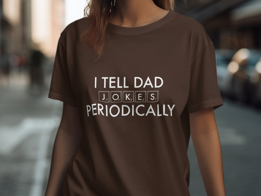 Brown t-shirt with white text: "I TELL DAD JOKES PERIODICALLY"