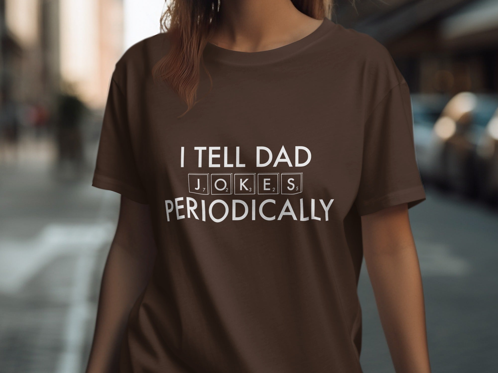 Brown t-shirt with white text: "I TELL DAD JOKES PERIODICALLY"