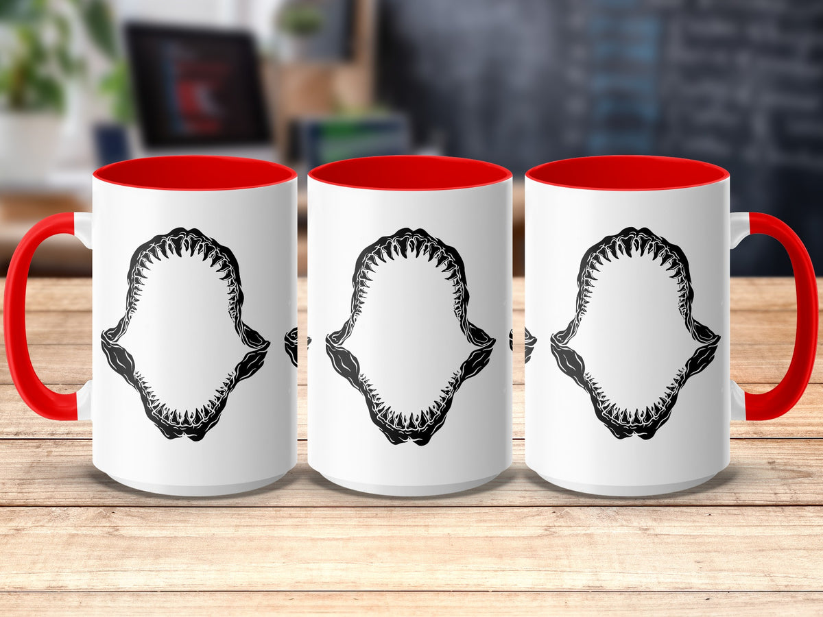 Three white mugs with red interiors and handles, featuring black shark jaw graphic.