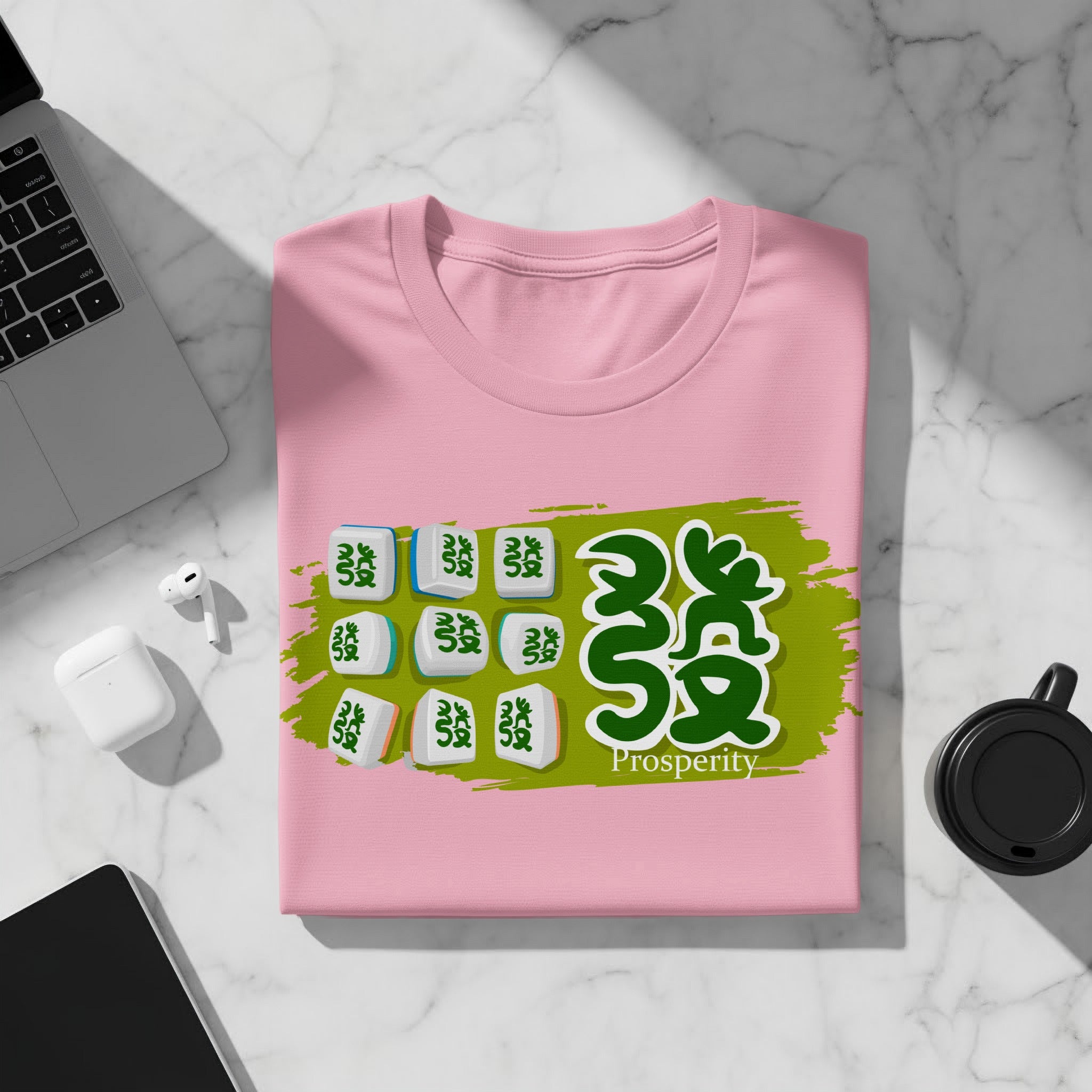 Pink t-shirt with mahjong tiles and green "Prosperity" text.