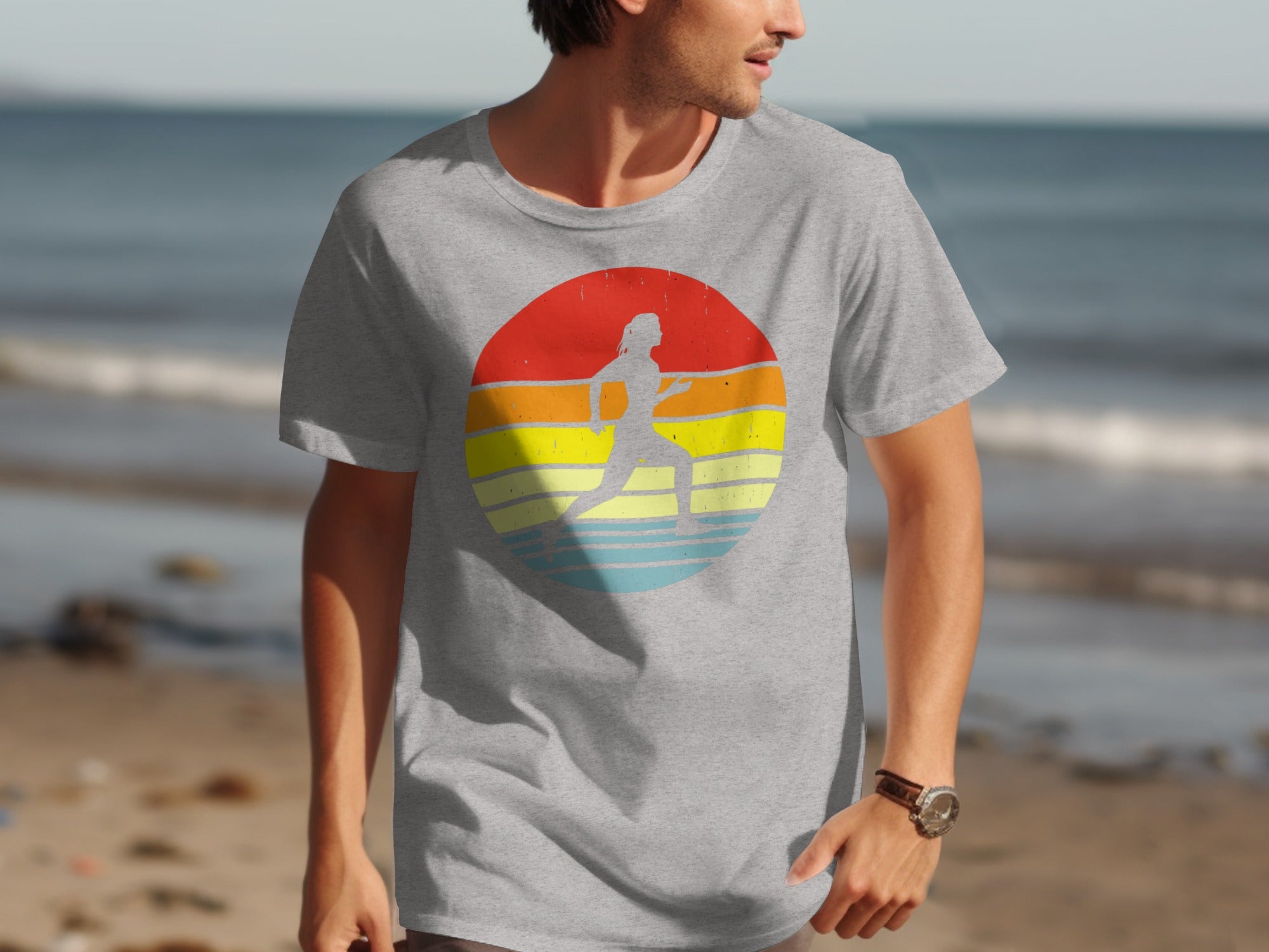 Grey t-shirt with a vintage sunset and runner graphic