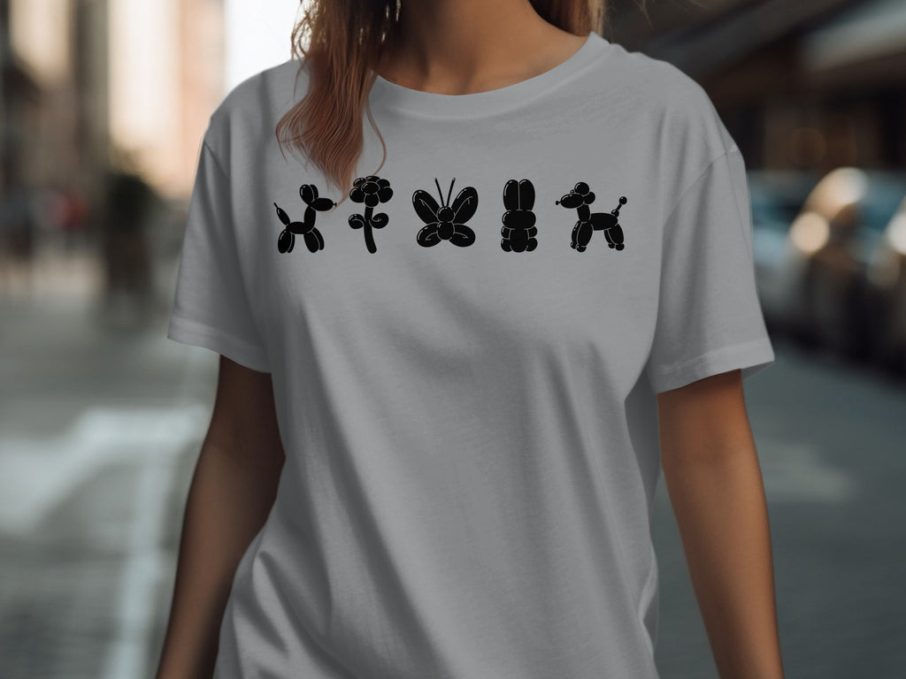 Grey t-shirt with black balloon animal icons of a dog, flower, butterfly, bunny, and dog.