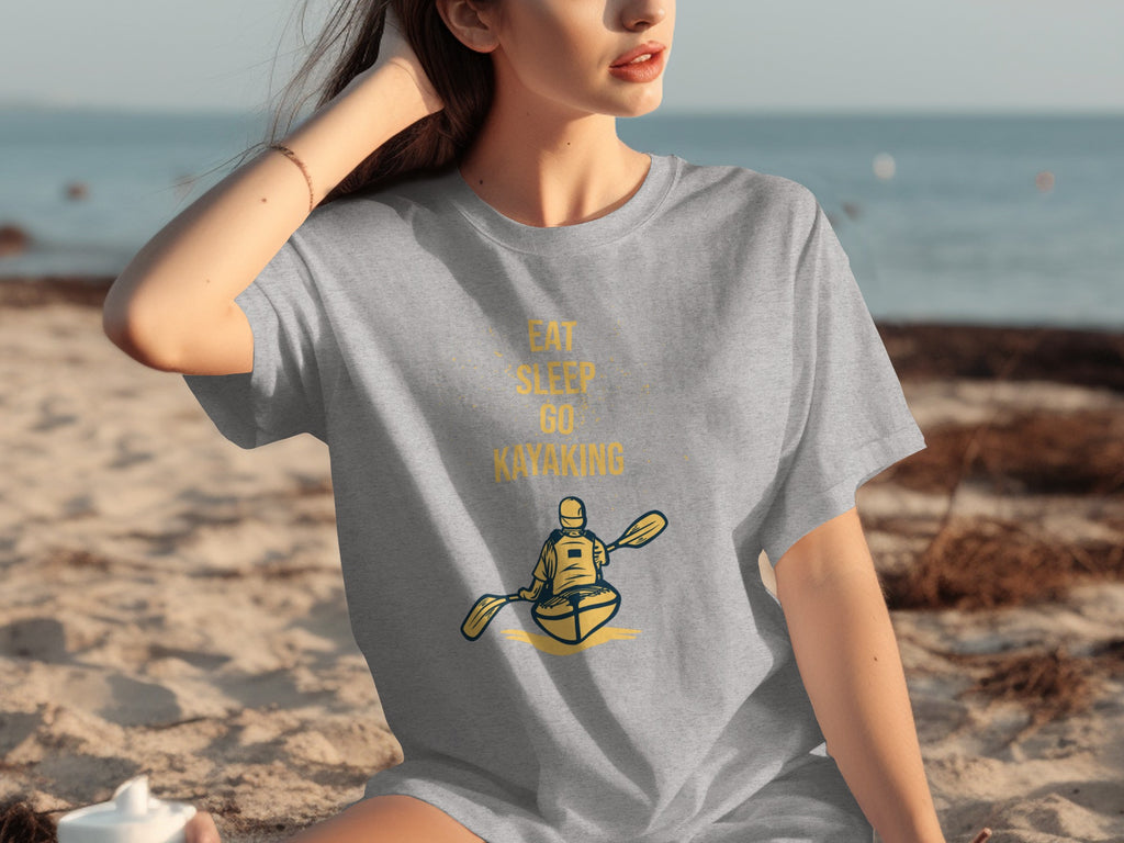 Grey t-shirt with "Eat Sleep Go Kayaking" text and kayak graphic.
