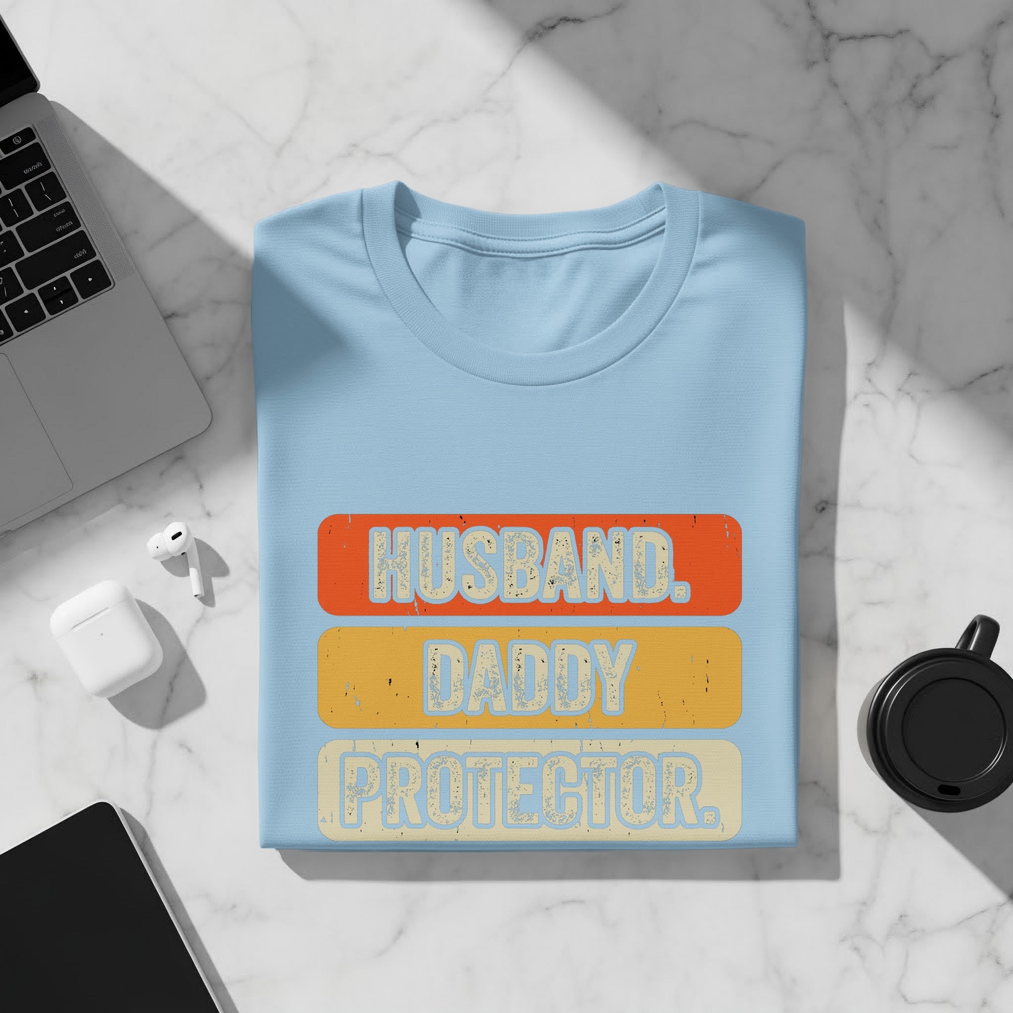 Light blue t-shirt with distressed text: Husband, Daddy, Protector.