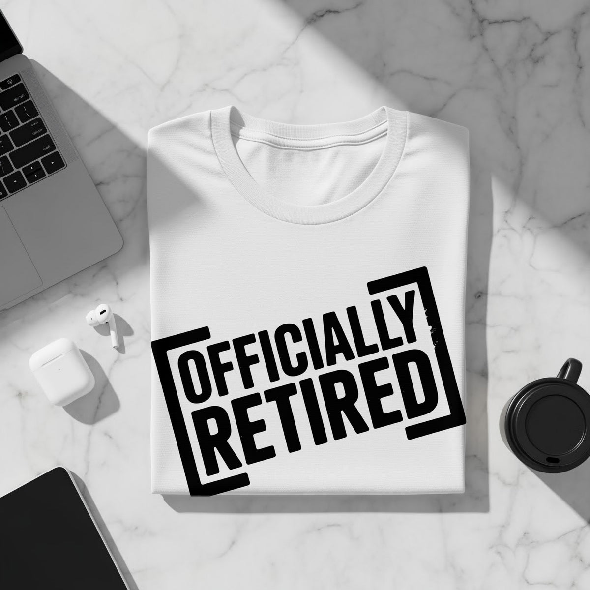 White t-shirt with black text that says "OFFICIALLY RETIRED"