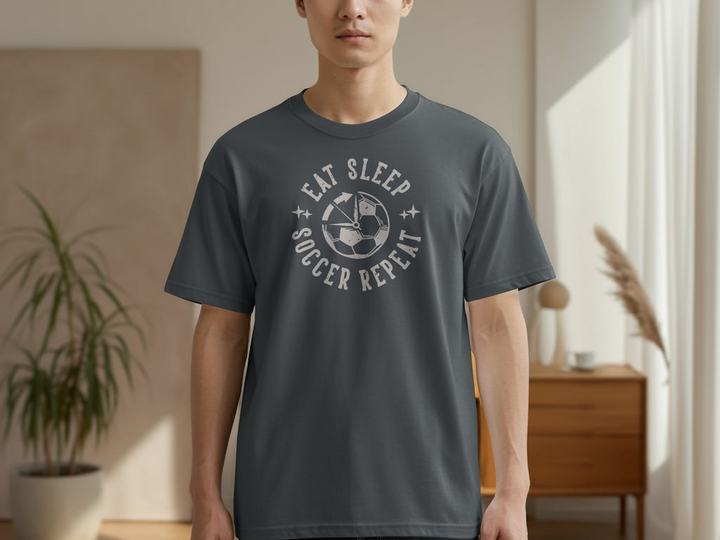 Dark grey t-shirt with "Eat Sleep Soccer Repeat" and soccer ball graphic.