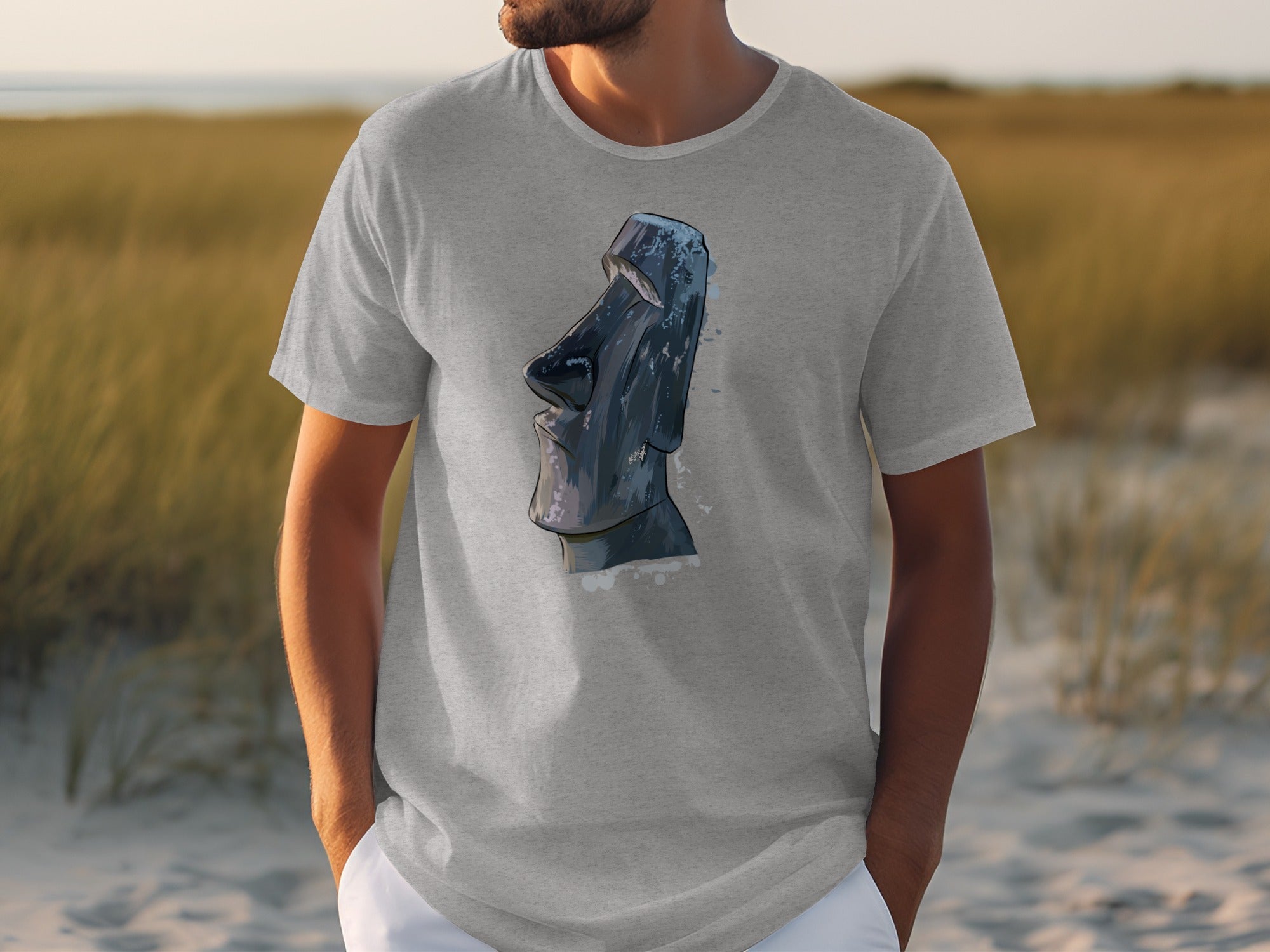 Grey t-shirt with a dark blue Moai statue graphic on the chest.