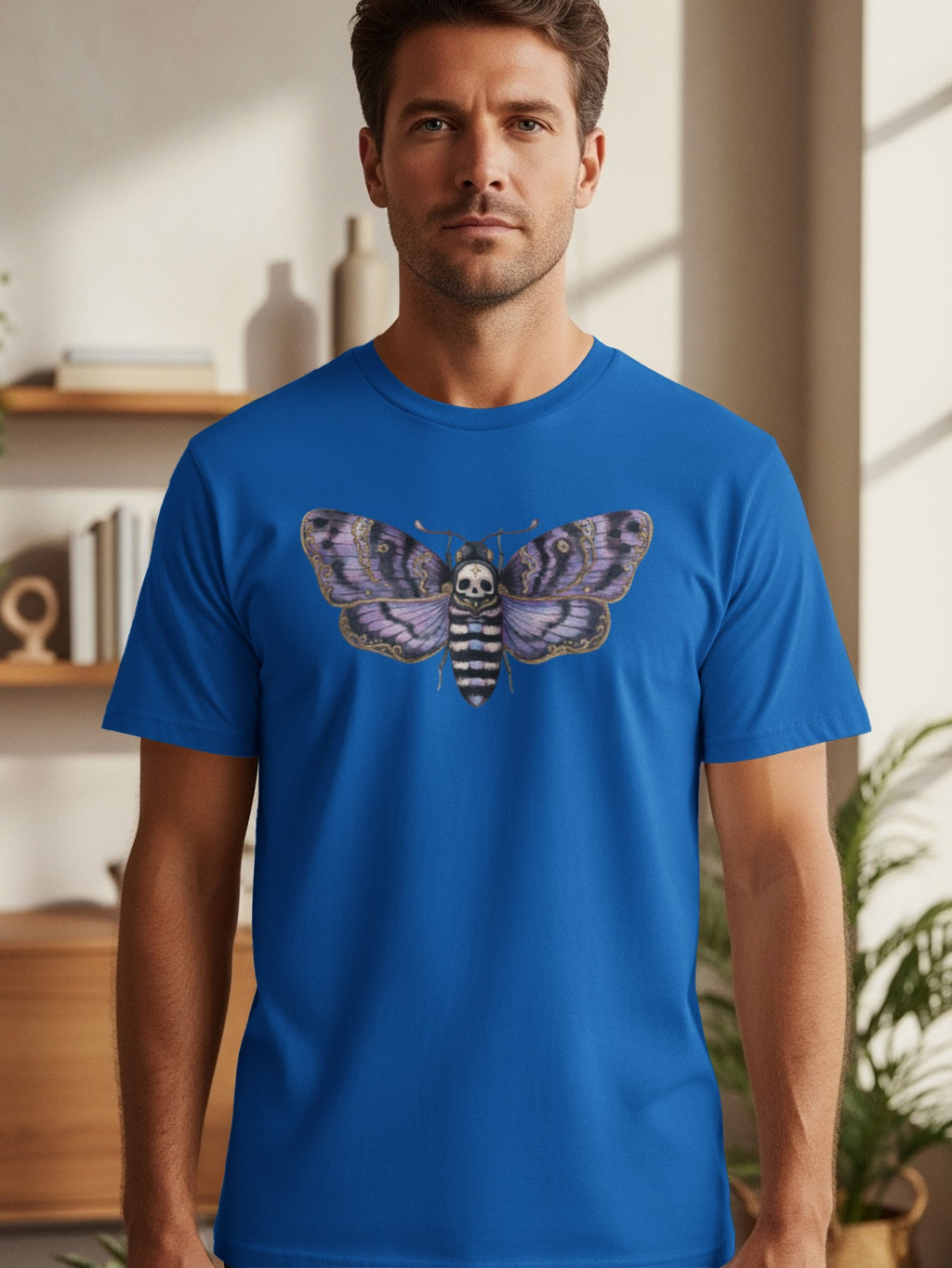 Blue t-shirt with a grey and purple death's-head hawkmoth graphic.