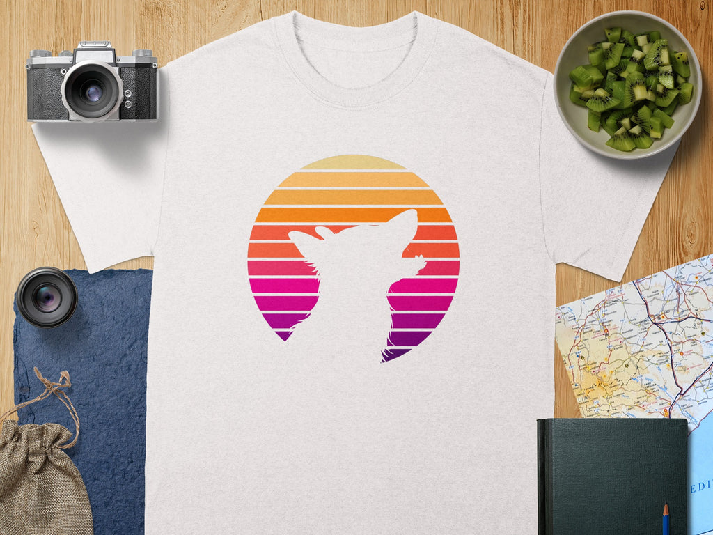 White t-shirt with a stylized dog's head in a retro sunset graphic.