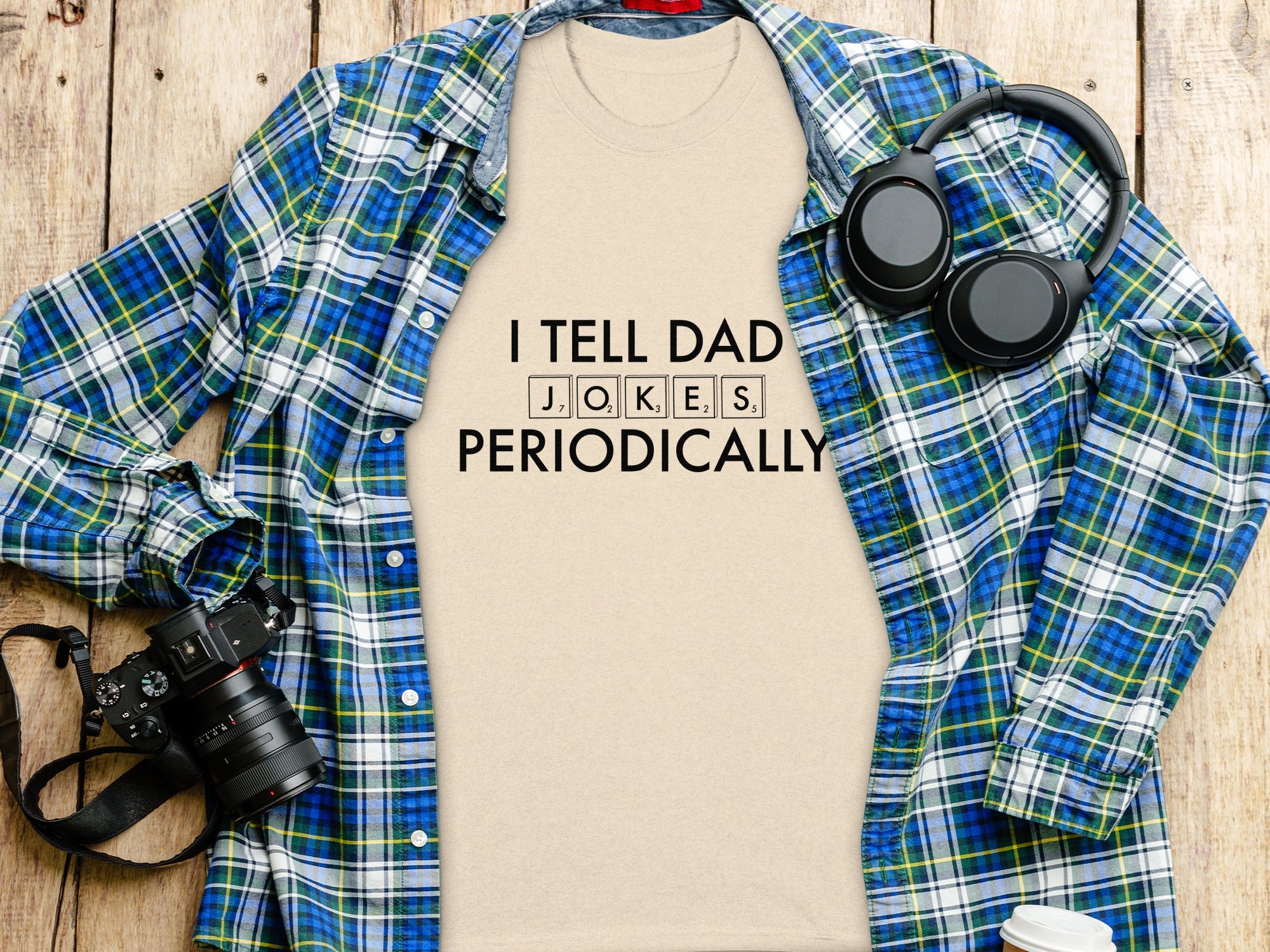 Cream t-shirt with "I TELL DAD JOKES PERIODICALLY" in black text.
